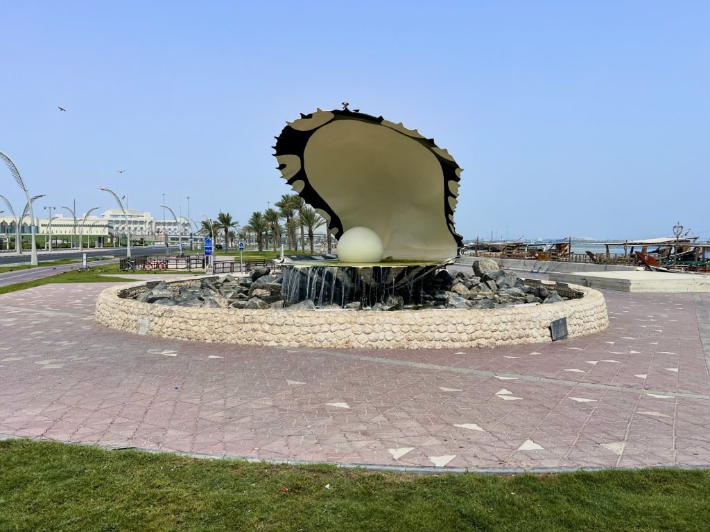 A photo of The Pearl Monument at the entrance to Dhow Harbour